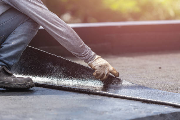 Professional Basement Waterproofing technician working in Collegeville, PA